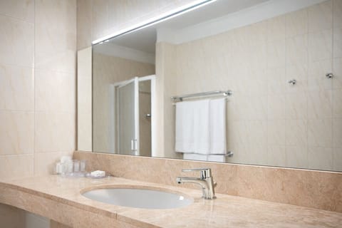 Shower, towels, toilet paper