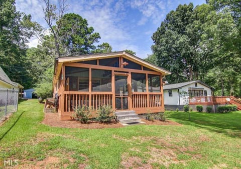 Screened porch overlooking the lake.