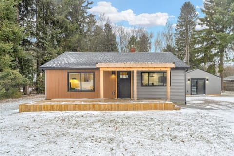 Modern cabin energy unlocked. Cozy meets cool with a porch that basically says your vacation starts right here.