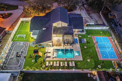 Outdoor Oasis: Dive into fun with a sparkling pool, sports courts, and family-friendly play areas!