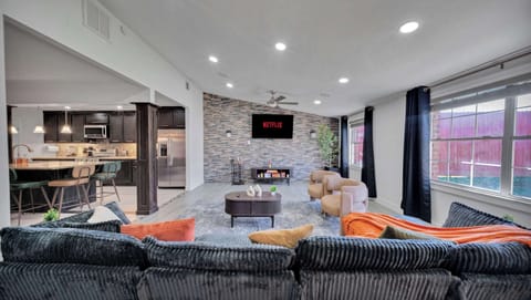 Enjoy movie nights and game time on the large smart TV in this comfortable space.