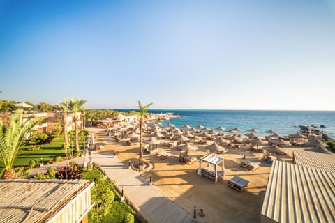 Private beach, beach umbrellas, beach towels, beach yoga