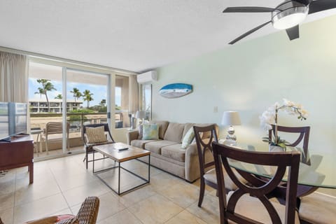 Unwind in your bright living space with tropical views, modern comfort, and island-inspired decor creating the perfect vacation atmosphere.