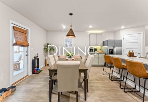 The dining area is perfect for shared meals, game nights, or lingering conversations over dessert.