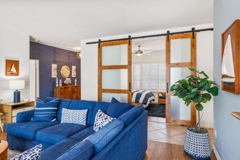 Stylish private 2BD/1BA townhome offered adjacent to attached owner's quarters