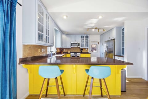 Your culinary adventure starts here. This kitchen is stocked and ready for everything from your morning coffee to a gourmet meal. This is the kitchen in the main house.