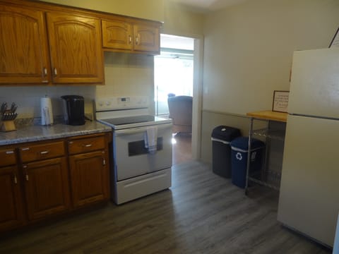 Full kitchen with stove, refrigerator, dish washer, microwave, coffee makers, pots/pans, and most other essentials.