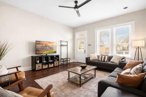 Living Room: Bright and cozy living room perfect for relaxing after a long day.