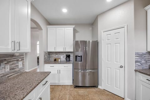 Refrigerator with in-built water + ice dispenser! Coffee bar includes a Drip coffee machine with complimentary coffee, decaf, tea, sugar, cream, and sweetener.