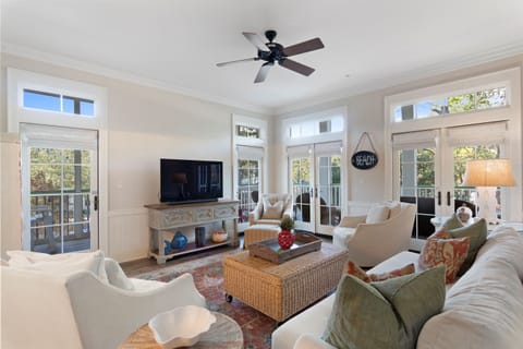 Large Open Living Room With Balcony Access