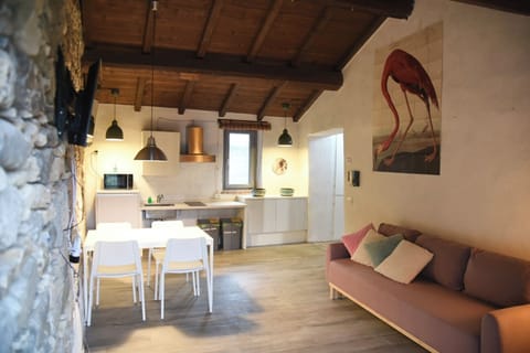 Deluxe Apartment, 1 Bedroom, Patio, Mountain View | Living area | Flat-screen TV