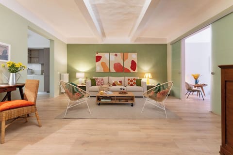 Apartment (2 Bedrooms) | Living area | 32-inch Smart TV with cable channels