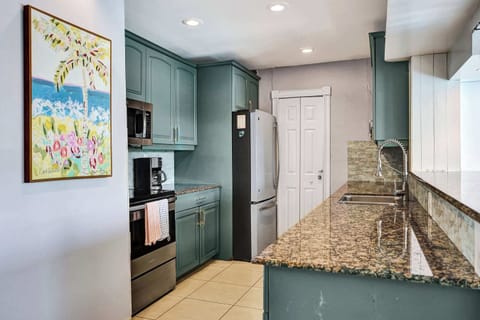 Unit 1’s inviting kitchen is well equipped for an unforgettable getaway