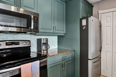 Unit 1’s inviting kitchen is well equipped for an unforgettable getaway