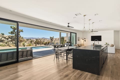 Modern desert retreat with pool views and seamless indoor-outdoor living