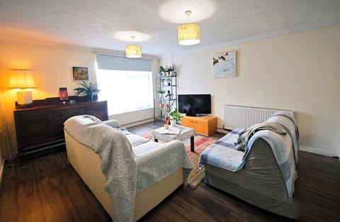 Relax in this bright, cozy lounge