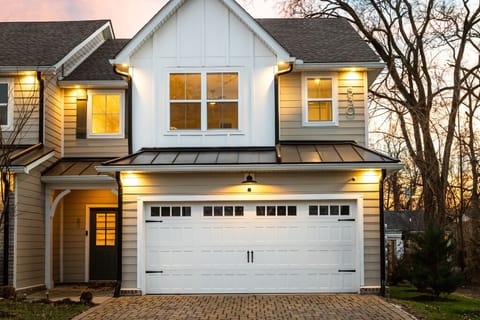 Modern townhome exterior with private garage in a quiet neighborhood