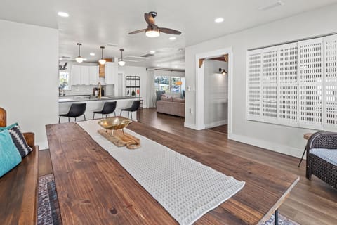 Dining area with open view through kitchen