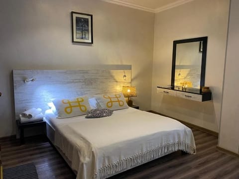 Double Room, City View | In-room safe, soundproofing, iron/ironing board, free WiFi