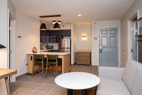 Desk, laptop workspace, blackout drapes, iron/ironing board