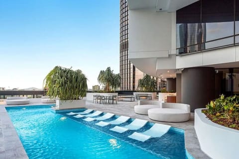 Take a dip in the sleek pool surrounded by tropical greenery and skyline views. We provide complimentary towels for use at the pool, sauna, and spa—just remember to bring them back after your swim.