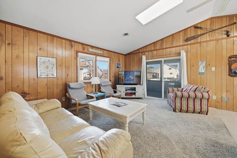 Top-level Living Room with Deck Access