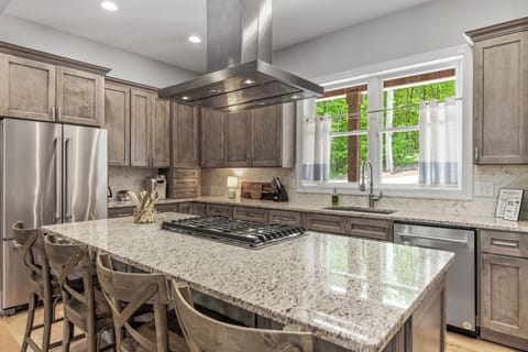 Island with seating and work space.