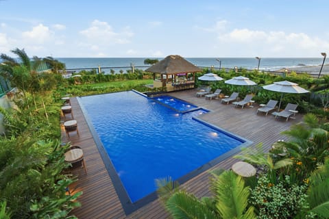 Outdoor pool, open 7:00 AM to 8:00 PM, pool umbrellas, sun loungers