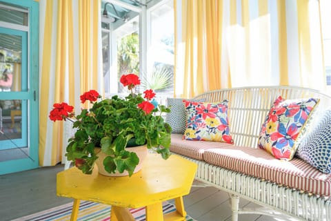 Welcome to Cottage on the Green B! 
Beautiful screened porch seating. So fun and relaxing...keep browsing for photos of the exterior and interior of this adorable cottage!