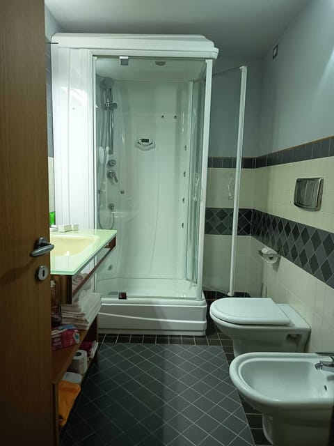 Superior Quadruple Room | Bathroom | Shower, hair dryer, towels, soap