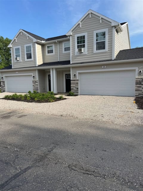 Beautiful modern townhouse with a private garage and bright exterior