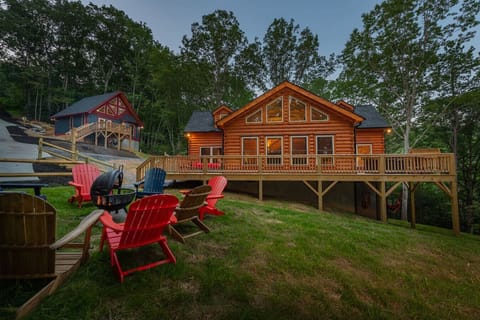 This view of the property displays everything you need to know about the location of parking, cabin layouts, and check out the upper level windows on both cabins that let in all the natural light. A beautiful place to spend time with a large group!