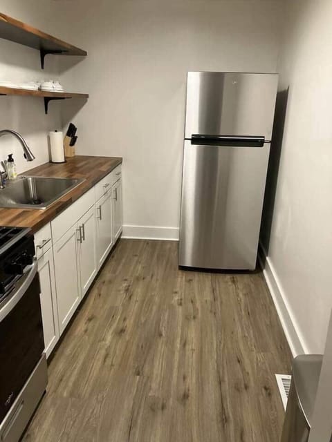 This well-appointed kitchen includes a Fridge, and plenty of counter space, as well as all the utensils and cookware you need to prepare meals. 