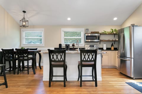 Bar seating and open kitchen layout ideal for extended stays in Brevard NC