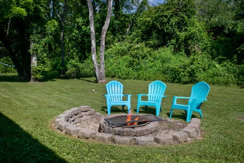 Outdoor fire pit seating perfect for relaxing during longer stays in Brevard