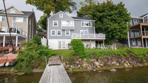 Another angle highlighting the home’s size and prime waterfront setting.
