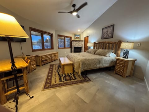 Primary Suite: north views, fireplace, clothes storage, private full bathroom