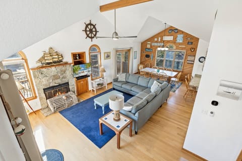 The loft sitting area offers a quiet space for reading or relaxing.