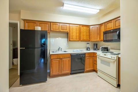Full kitchen includes stove top, oven, microwave, dishwasher, refrigerator, and more!