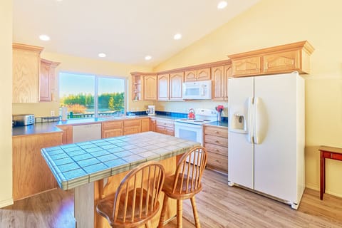 Kitchen bar seating ideal for kids to lend a hand with food prep