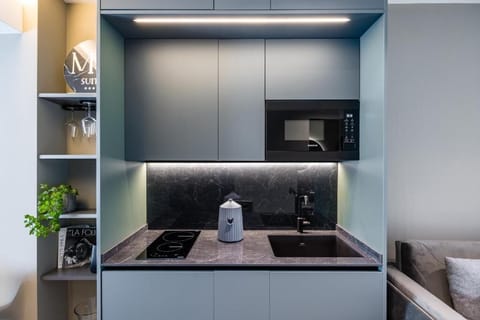 Junior Suite, 1 Queen Bed with Sofa bed, City View | Private kitchen | Mini-fridge, coffee/tea maker