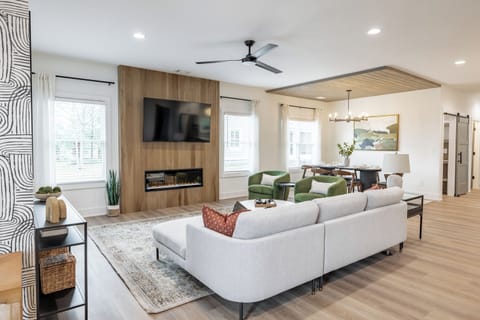 Spacious open concept floor plan with an electric fireplaces & smart tv. 