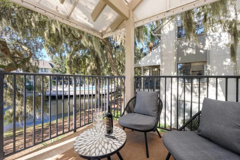 Cozy outdoor seating area perfect for sunset drinks by the water.