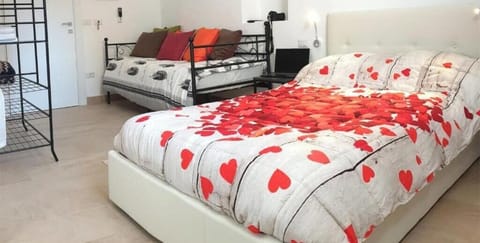 Comfort Twin Room, City View | Down comforters, memory foam beds, desk, soundproofing