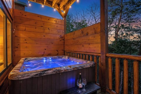 Hot Tub Oasis: Relax under twinkling lights while soaking in views and bubbles!