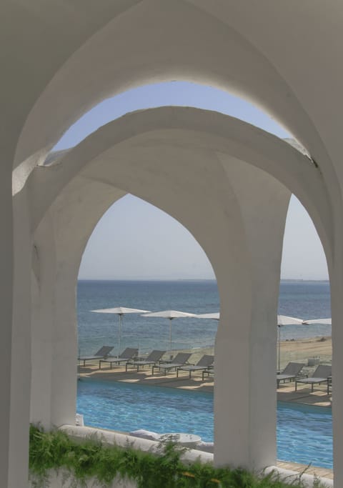 Private beach, white sand, sun loungers, beach umbrellas