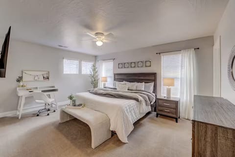 Escape to this private, upstairs king bedroom with a luxurious ensuite, the ideal space for rest and relaxation.