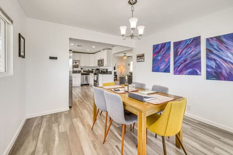 Dining Area | Table Seating | Chandelier Lighting & Window Exposure
