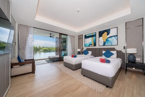 Exclusive Apartment, 2 Bedrooms (Angsana Lakeside Luxury Jazuzzi Suite) | In-room safe, individually decorated, individually furnished, desk