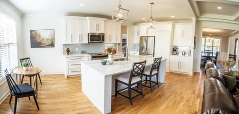 Large Kitchen with coffee/tea station, large center island, and a walk-in pantry